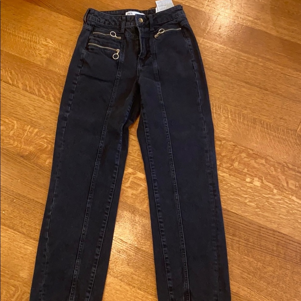 High rise black straight jeans with gold detail